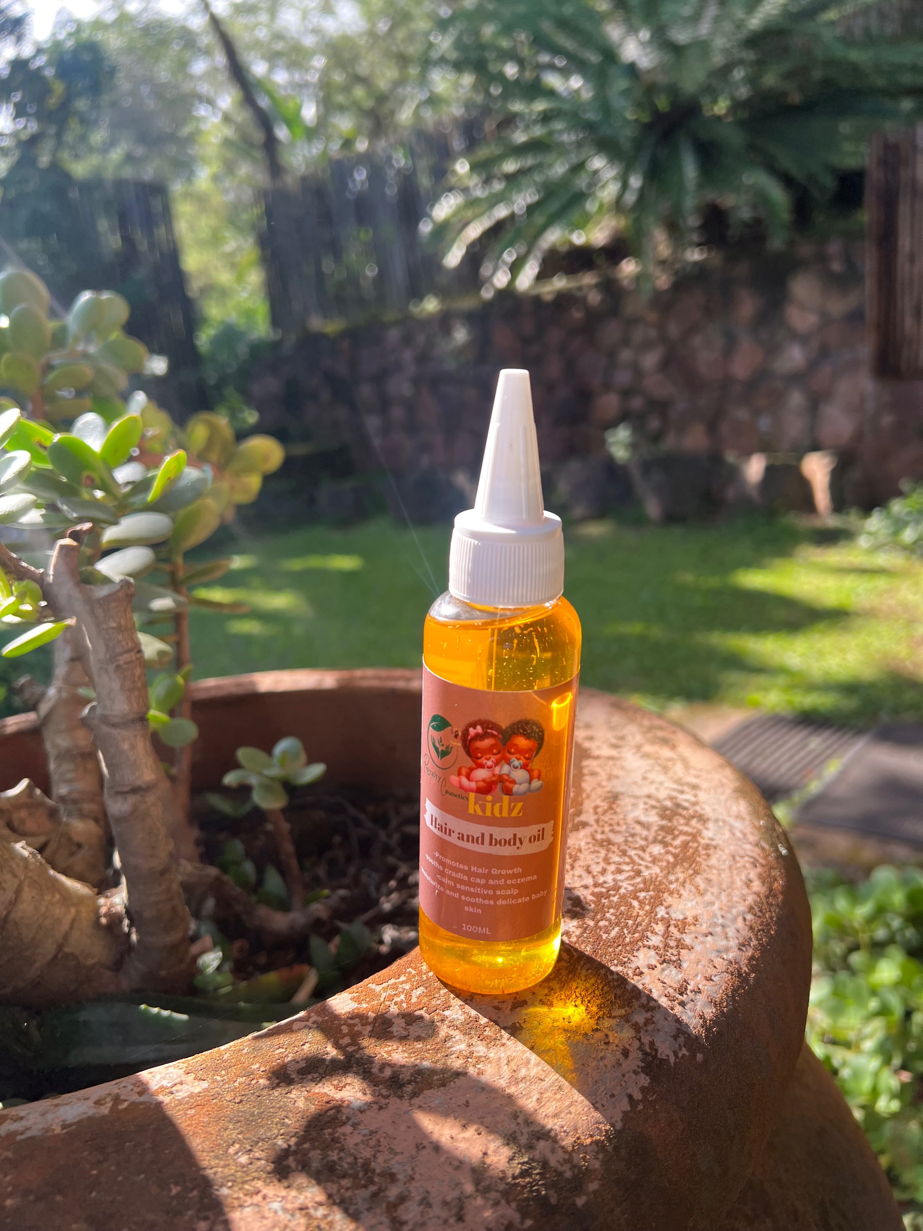 Baby hair and body oil